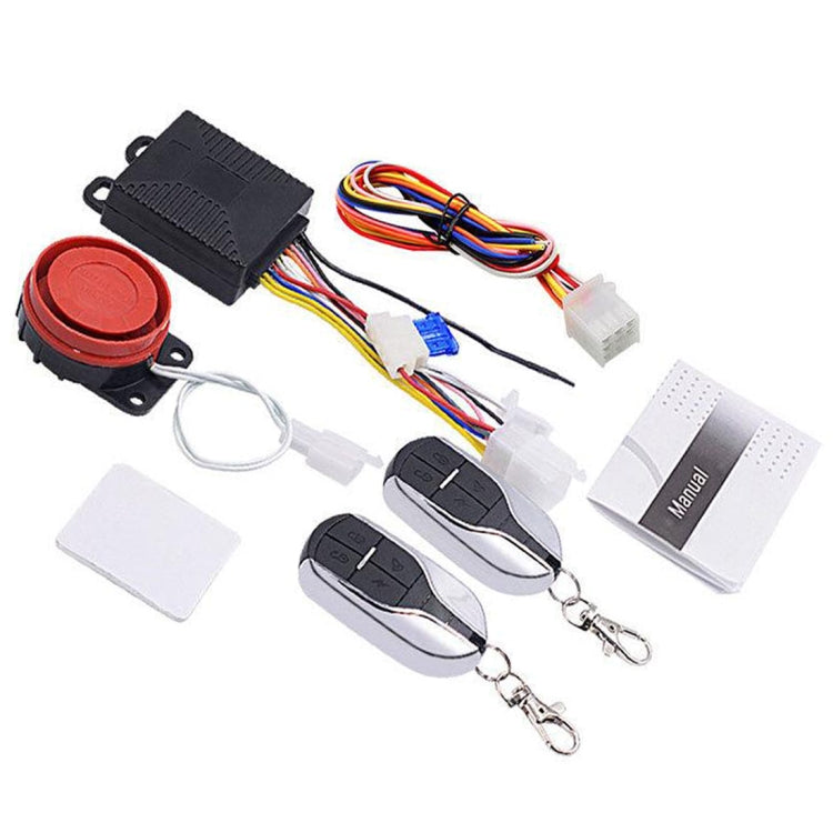 Motorcycle anti-theft alarm kit with red siren button, black module, wiring, remotes