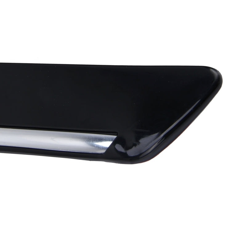 Black bumper guard strip end with chrome-like trim line