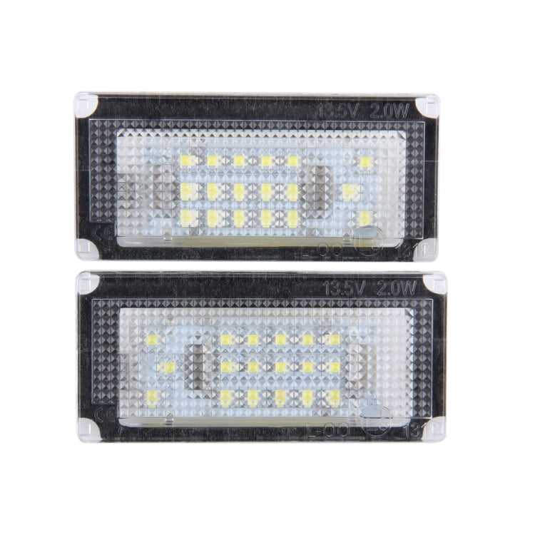 Two license plate LED light boards in clear housings, visible SMD chip layout