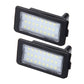 2-piece LED license plate light set, black housings with clear front lens and SMD LEDs