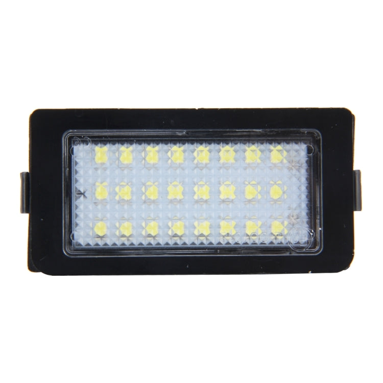 LED license plate light with clear front lens showing 24 SMD LED array in black frame