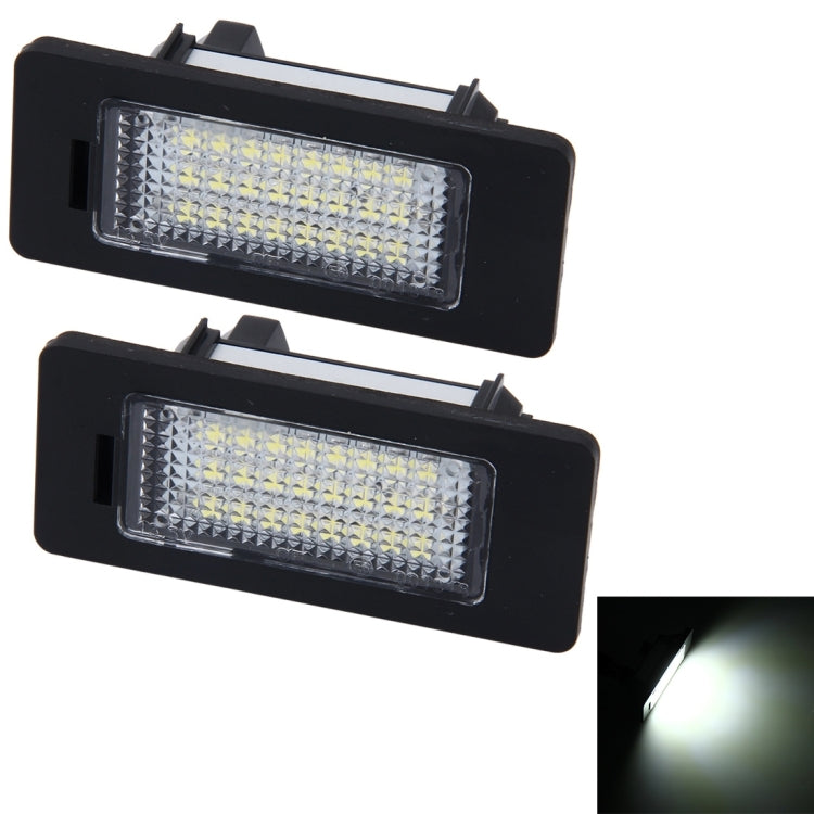 LED license plate lights, two black rectangular units with clear lens panels