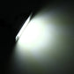 LED license plate light glowing bright white from a black housing