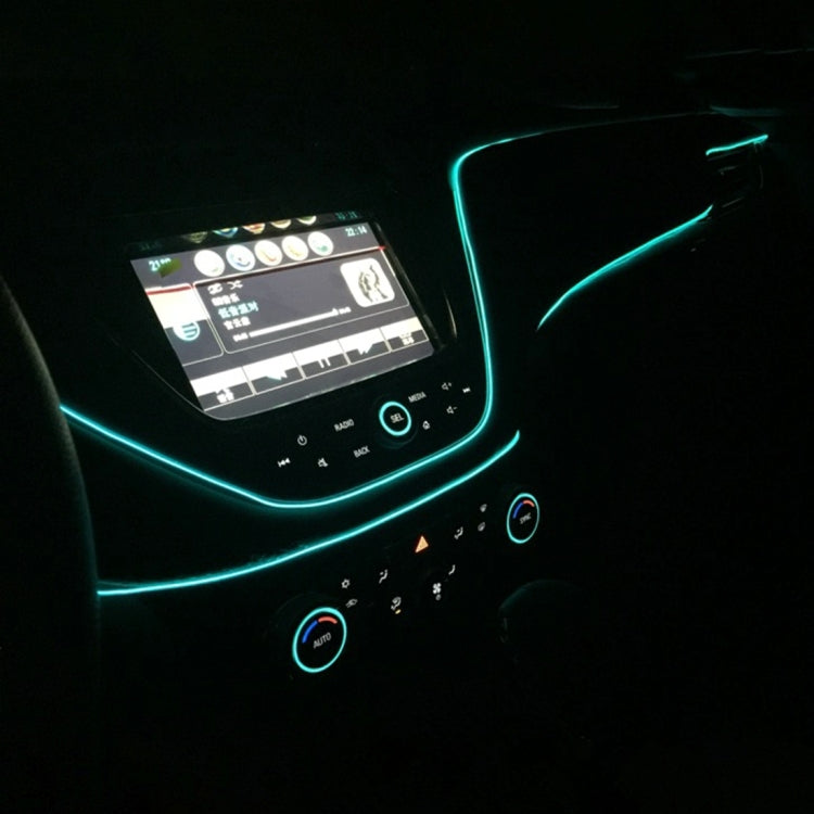 Car LED strip light glowing green in dashboard area with connected controls