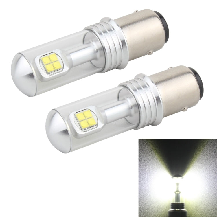 Pair of LED car turn light bulbs, clear lens with yellow LED chips and metal base, white glow.