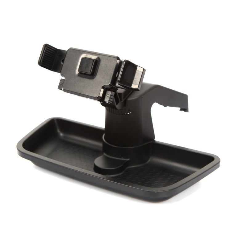 Black dashboard phone mount holder with clamp arms and swiveling base