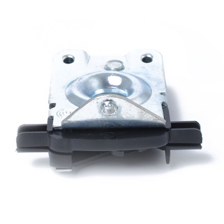 Hood lock latch catch block viewed from front with round opening and black bumper base