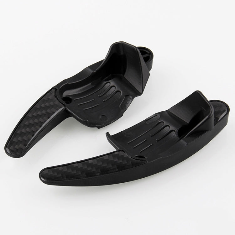 Pair of black paddle shift extensions with carbon-fiber style side grips