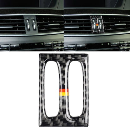 Carbon-fiber air outlet sticker panel with two oval cutouts and German flag stripe