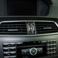 Installed carbon-fiber air outlet sticker with two ovals and German flag stripe