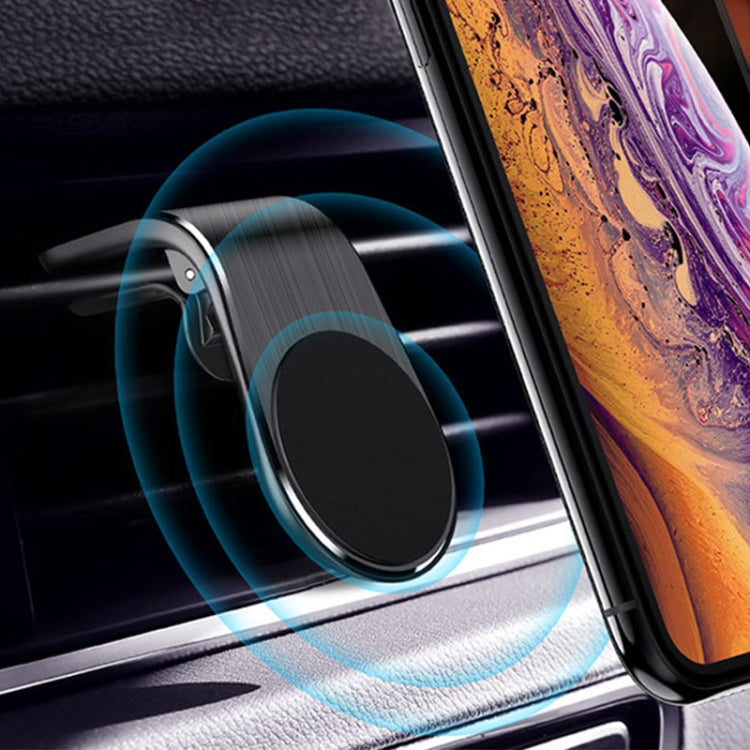Air outlet magnetic phone holder with dark gray magnet face and vent-mount clip