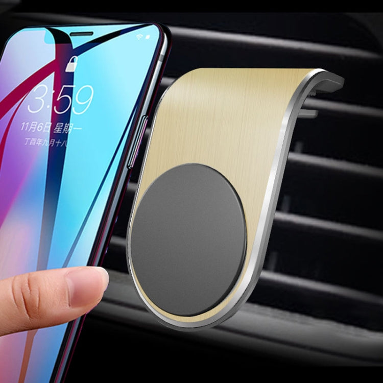 Air outlet magnetic phone holder with gold frame and dark gray circular magnet pad