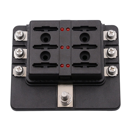 6-way fuse holder base with four mounting screws and two circular terminal openings