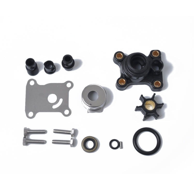 Outboard water pump impeller repair kit parts, black plastic seals, gasket, screws, and washers