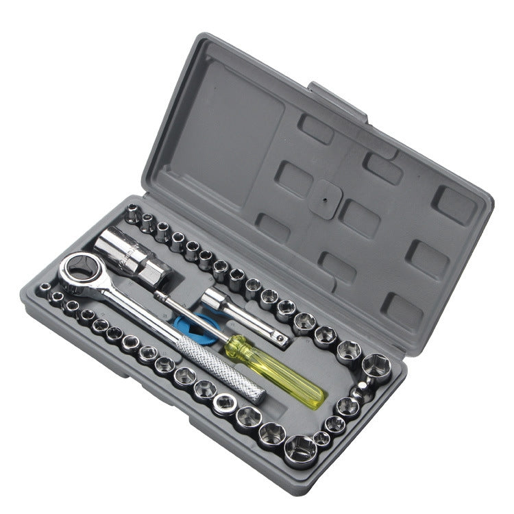 Socket wrench set with multiple chrome sockets and tools in open gray case