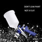 Blue pneumatic spray gun with white paint cup and metal air adjustment nozzle
