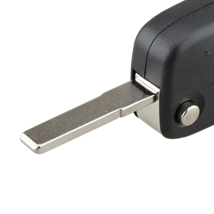 Black key fob case with metal key blade extended