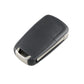 Black car key fob case with silver edge trim, side profile with blade folded.