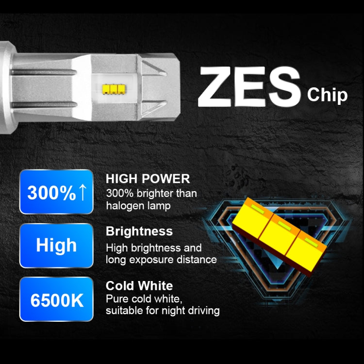 LED headlight bulb close-up with silver body and yellow LED chip, cooling fins visible