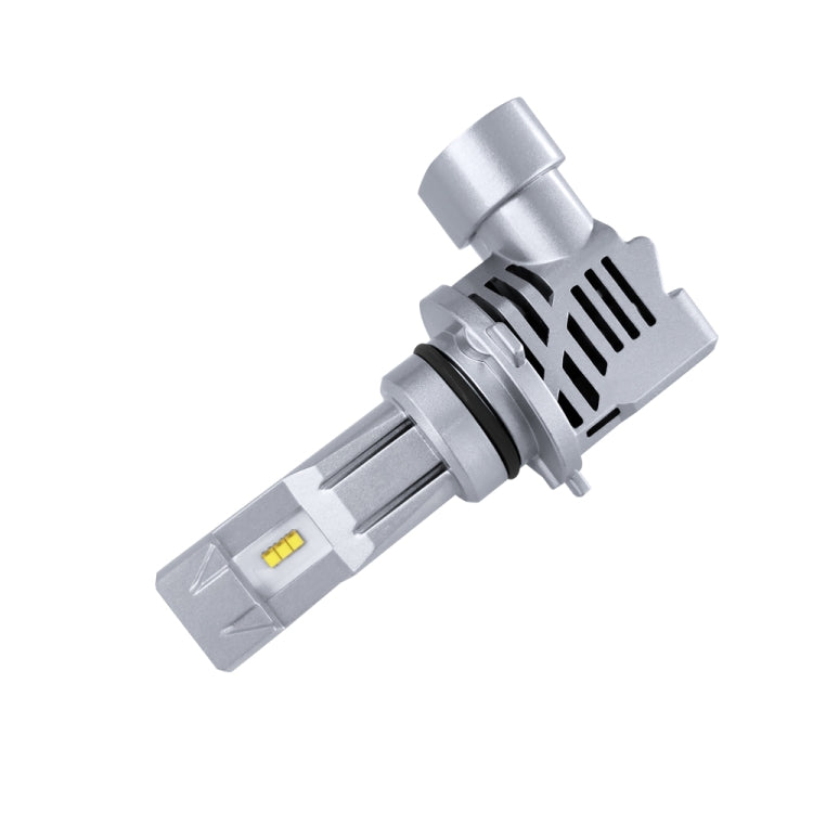 Silver LED headlight bulb module angled view with cooling fins and a small yellow LED chip.