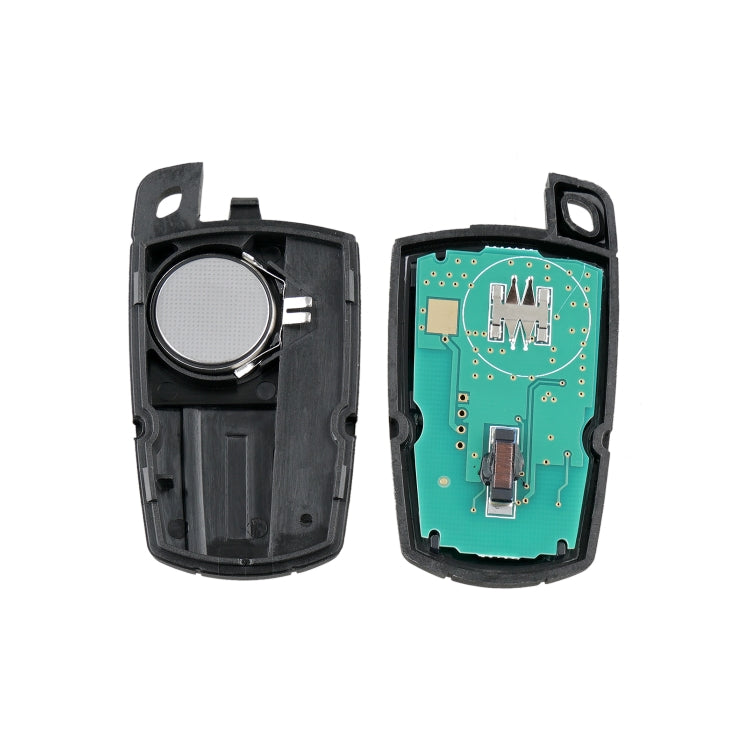 Key fob inner halves showing switch area and green circuit board with contacts