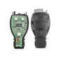 Remote key fob with internal circuit board exposed, plus rear case and blade key