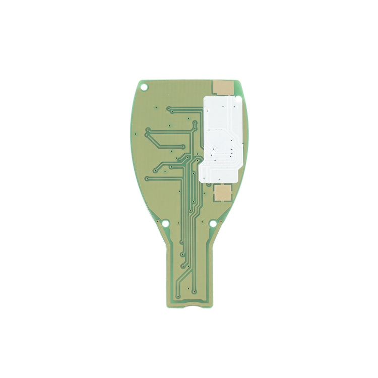 Back side of green remote key circuit board with copper traces and contact pads