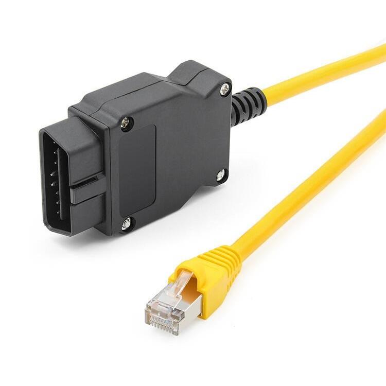Black adapter box with RJ45 Ethernet plug and yellow cable