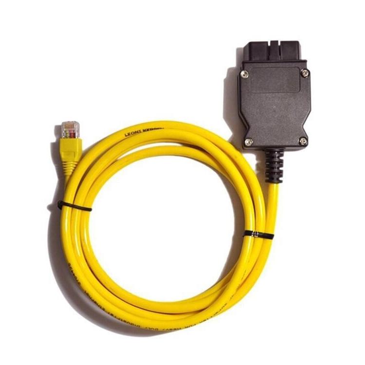 Coiled yellow Ethernet cable with RJ45 plug and black adapter block