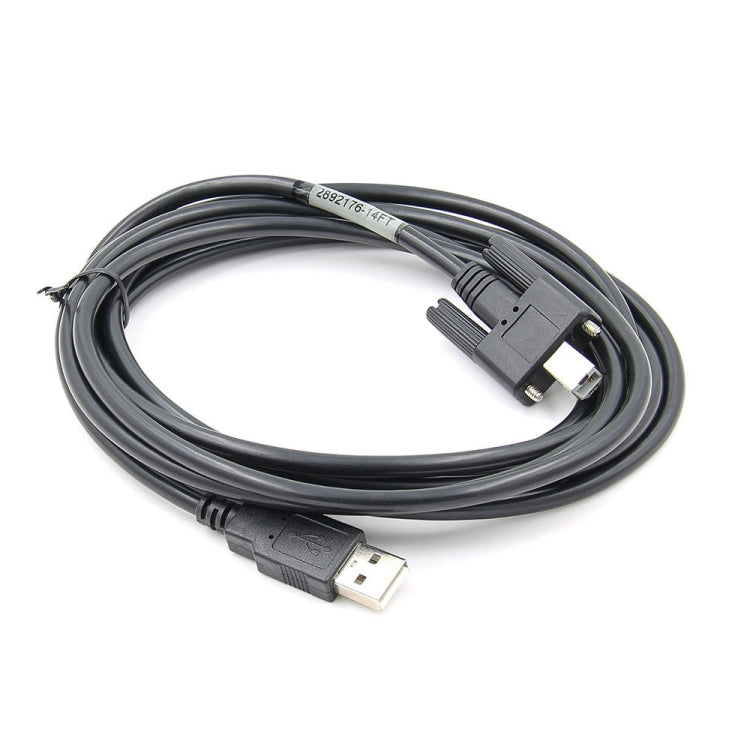 Black USB cable with molded connectors for diagnostic tool, coiled