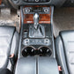 Installed gearshift panel frame sticker in black carbon fiber on center console