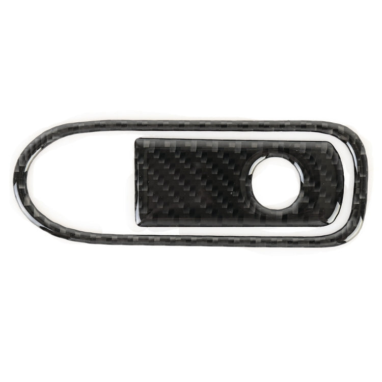 Carbon fiber-pattern oval switch bezel with raised dark edge and circular switch opening