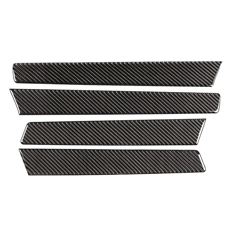 Black carbon fiber door panel trim stickers, four long rectangular strips on white background