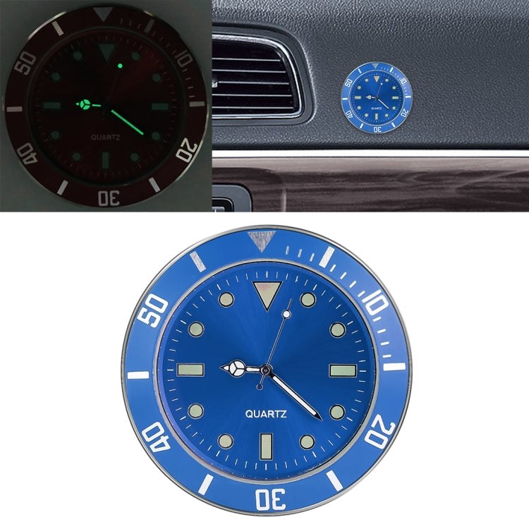 Blue luminous quartz car watch with dark dial and green glowing hands and markers