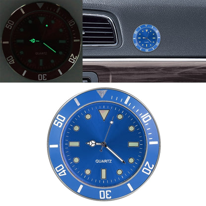 Blue luminous quartz car watch with dark dial and green glowing hands and markers