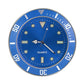 Blue quartz car watch with round dial, silver markers, and needle hands