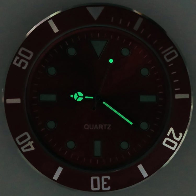 Blue car watch with green luminous dial, glowing dots, and silver markers