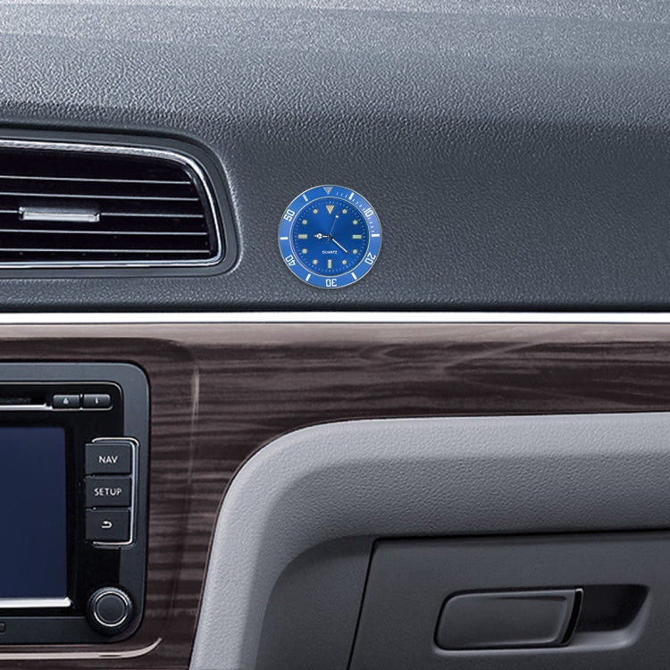 Blue round quartz car watch mounted on a dashboard