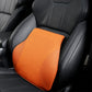 Car lumbar pillow in orange with textured grid and curved side support