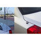Car roof antenna base and silver mast installed on trunk panel