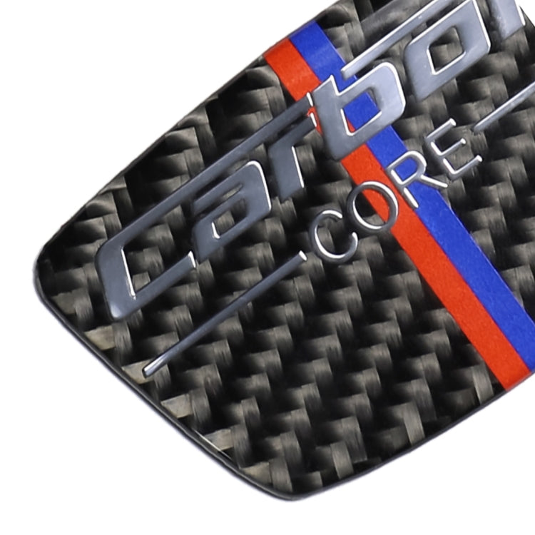Diagonal close-up of carbon fiber-look B-pillar sticker with blue and orange stripes