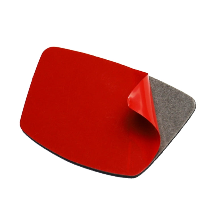Red protective cover pad over a small molded sticker backing