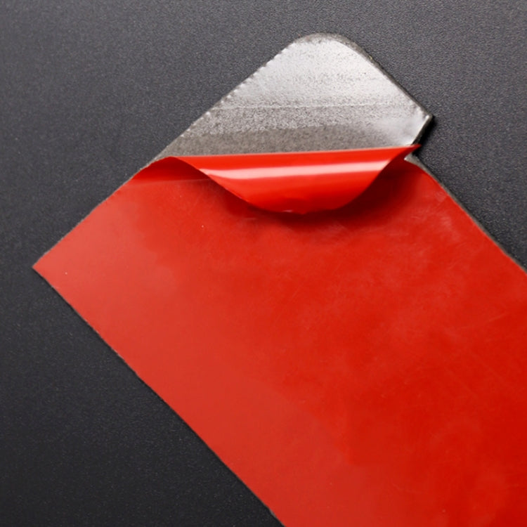 Adhesive backing for carbon fiber-look storage panel sticker, red backing sheet