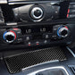 Installed carbon fiber-look storage lighter panel sticker on car center console, black weave