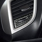 Carbon fiber air vent trim insert installed inside dashboard air outlet surround