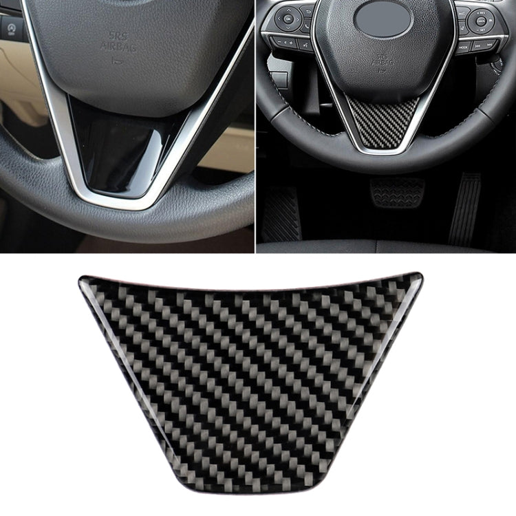 Triangular carbon fiber steering wheel trim sticker on dark steering column insert