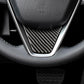 Installed triangular carbon fiber steering wheel trim insert with metal border