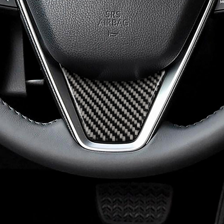 Installed triangular carbon fiber steering wheel trim insert with metal border