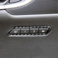 Installed carbon fiber-look seat memory adjustment trim on dark leather door panel