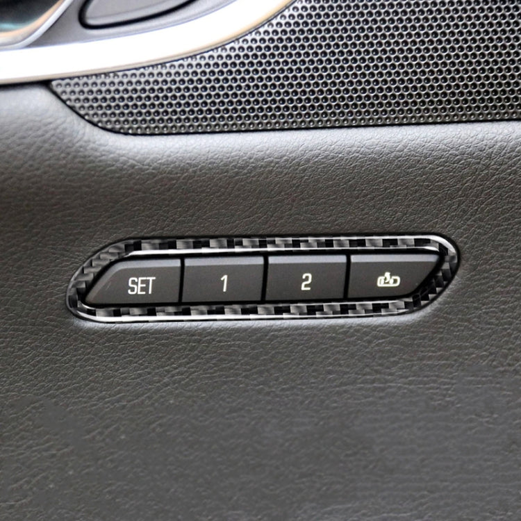Installed carbon fiber-look seat memory adjustment trim on dark leather door panel